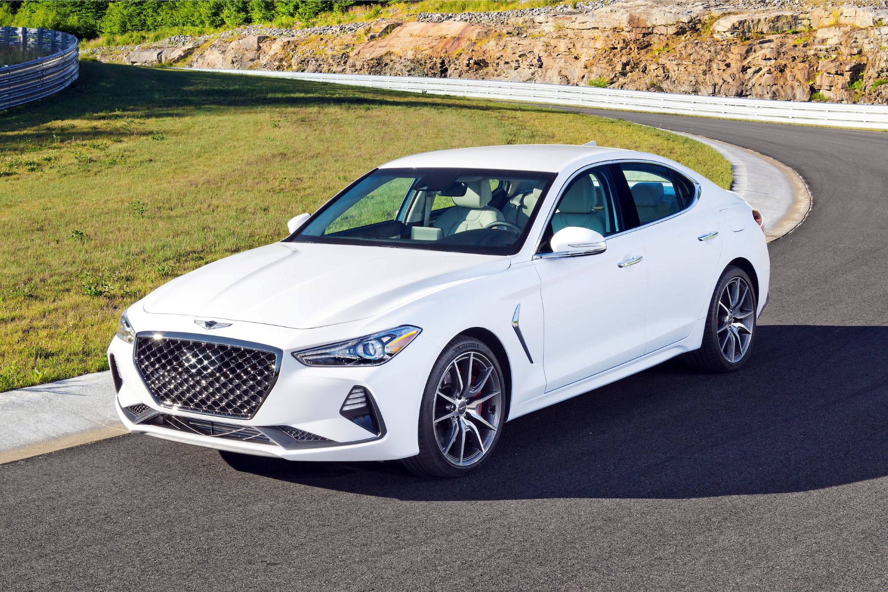 A white Genesis G70, reported as one of the most satisfying vehicles in the South by Consumer Reports