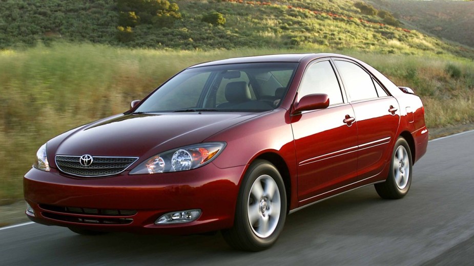 a red 2004 toyota camry se, a midsize sedan with surprising performance