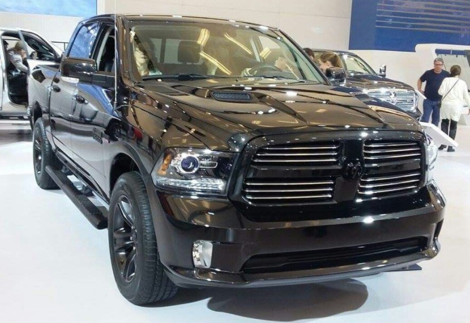 A black 2013 Ramm 1500 sits on display as a full-size truck.