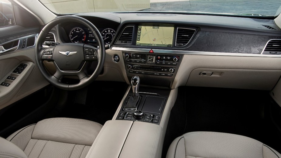 the interior of a 2016 hyundai genesis, a outstanding luxury sedan that surrounds you with top not features and technology
