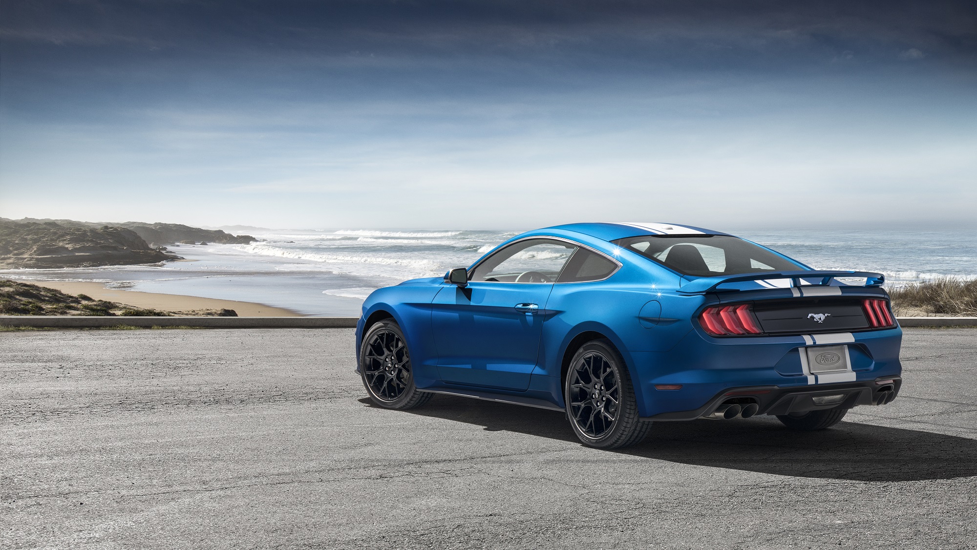 The Ford Mustang EcoBoost, like this blue example, gets commendable mpg.