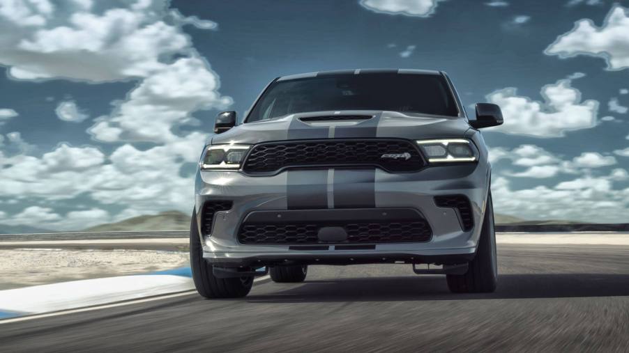 A gray 2021 Dodge Durango against a cloudy background.