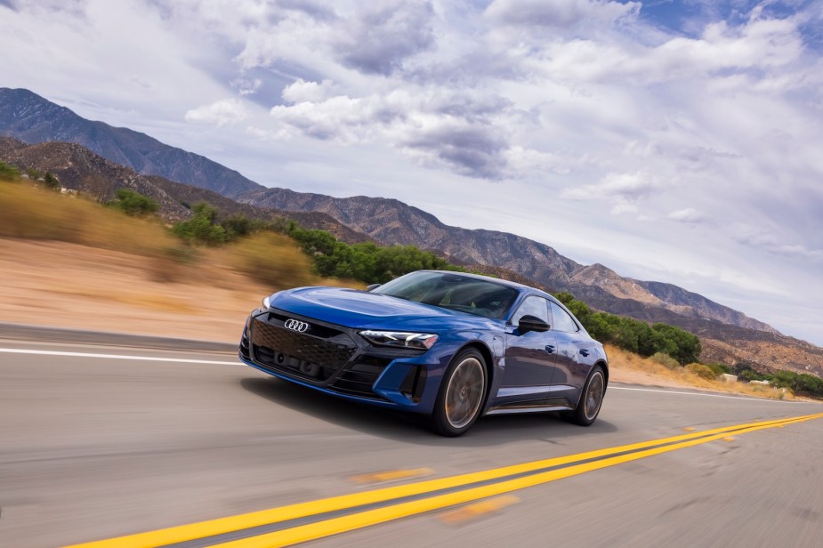 A blue 2022 Audi e-tron GT driving
