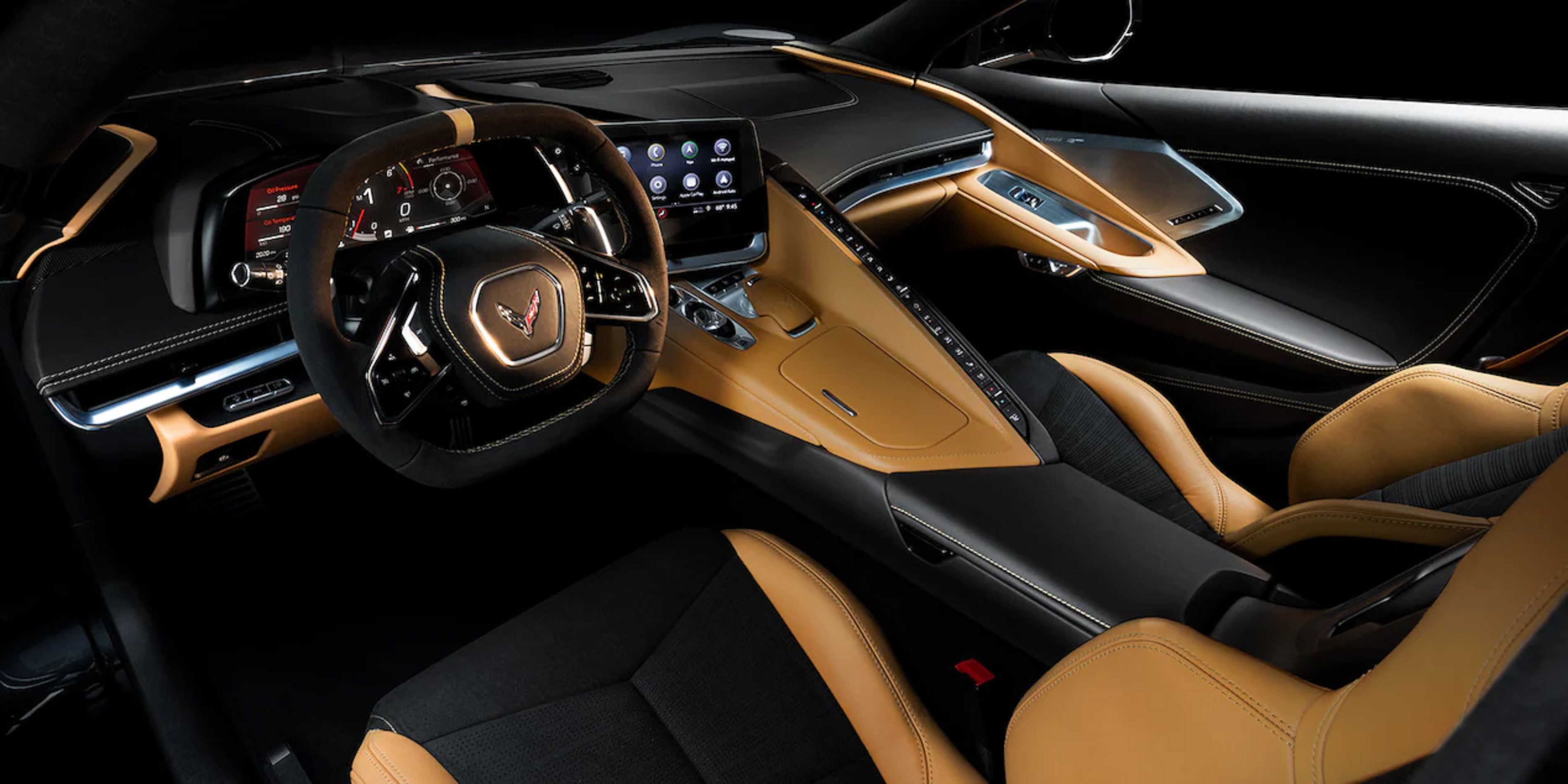 The tan-and-black optional GT2 seats and dashboard of a 2022 Chevrolet C8 Corvette 3LT Coupe