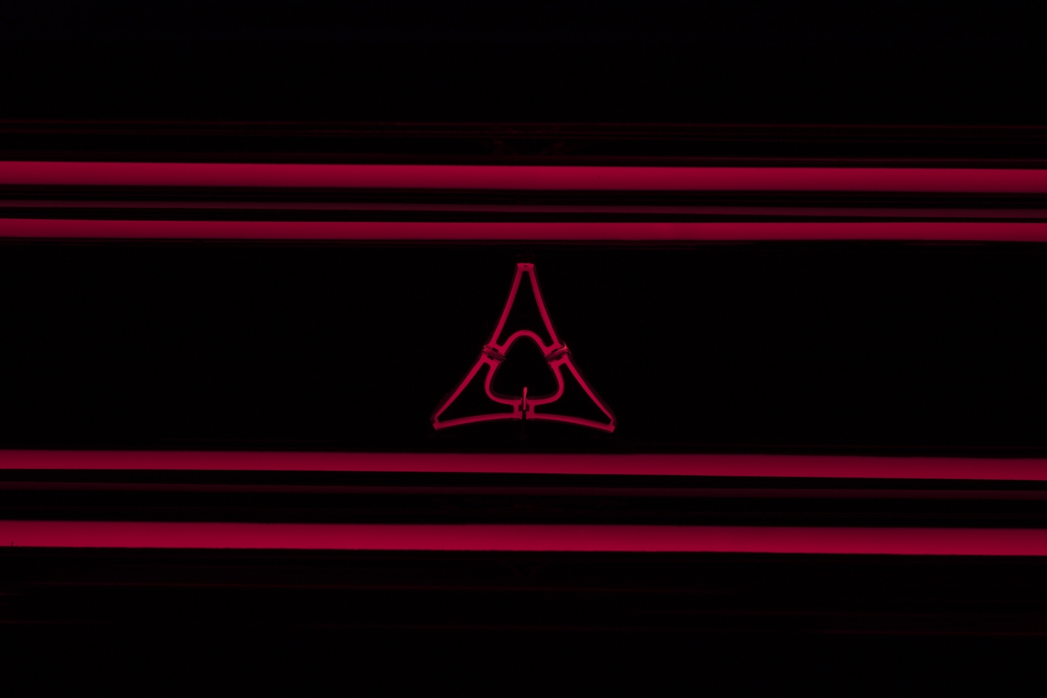 Closeup of the illuminated Fratzog logo of the Charger Daytona SRT EV concept car.