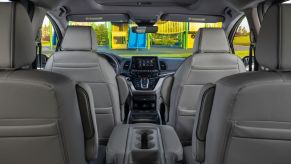 The cabin interior and seating layout of the 2023 Honda Odyssey minivan