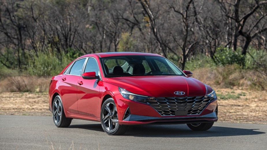 a red 2022 hyundai elantra, a compact sedan recommended by consumer reports