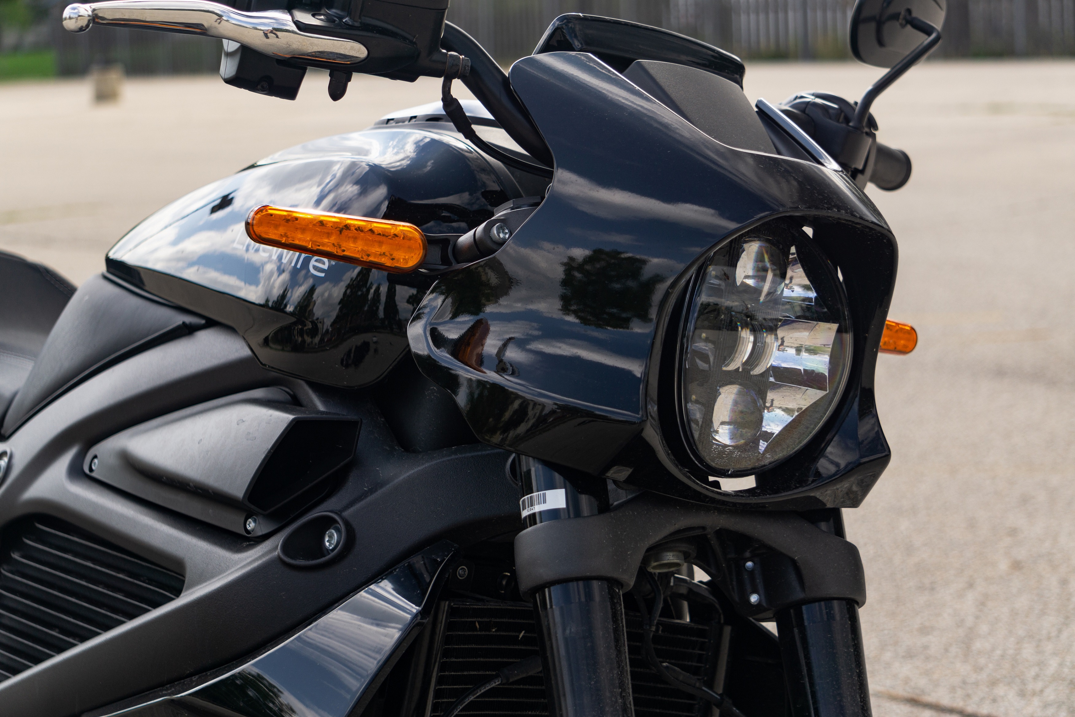 A black 2022 LiveWire One's LED headlight and fairing