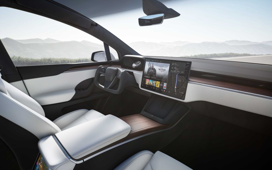 Interior of a 2022 Tesla Model X. It is not recommended by Consumer Reports due to lack of technology.