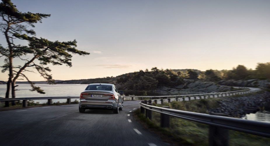 2022 Volvo S60 driving on a road.