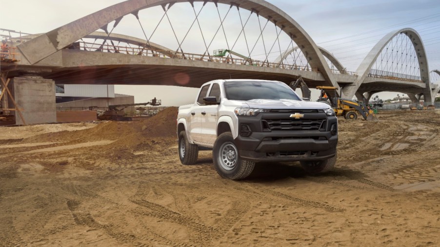Front view of the 2023 Chevrolet Colorado Work Truck at construction site.