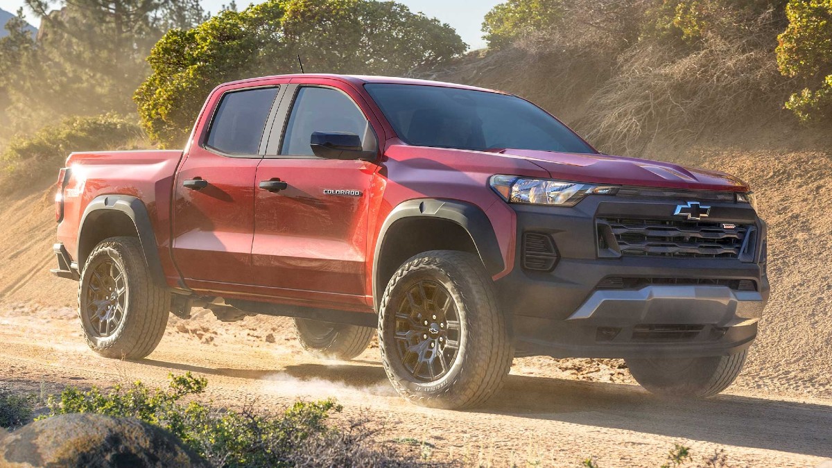 Red 2023 Chevy Colorado Trail Boss Kicking Up Dust on the Trails