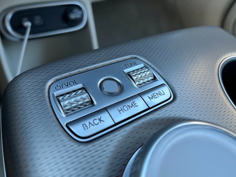 The fingerprint scanner in the GV60 is on the center console between the volume and tuning knobs.