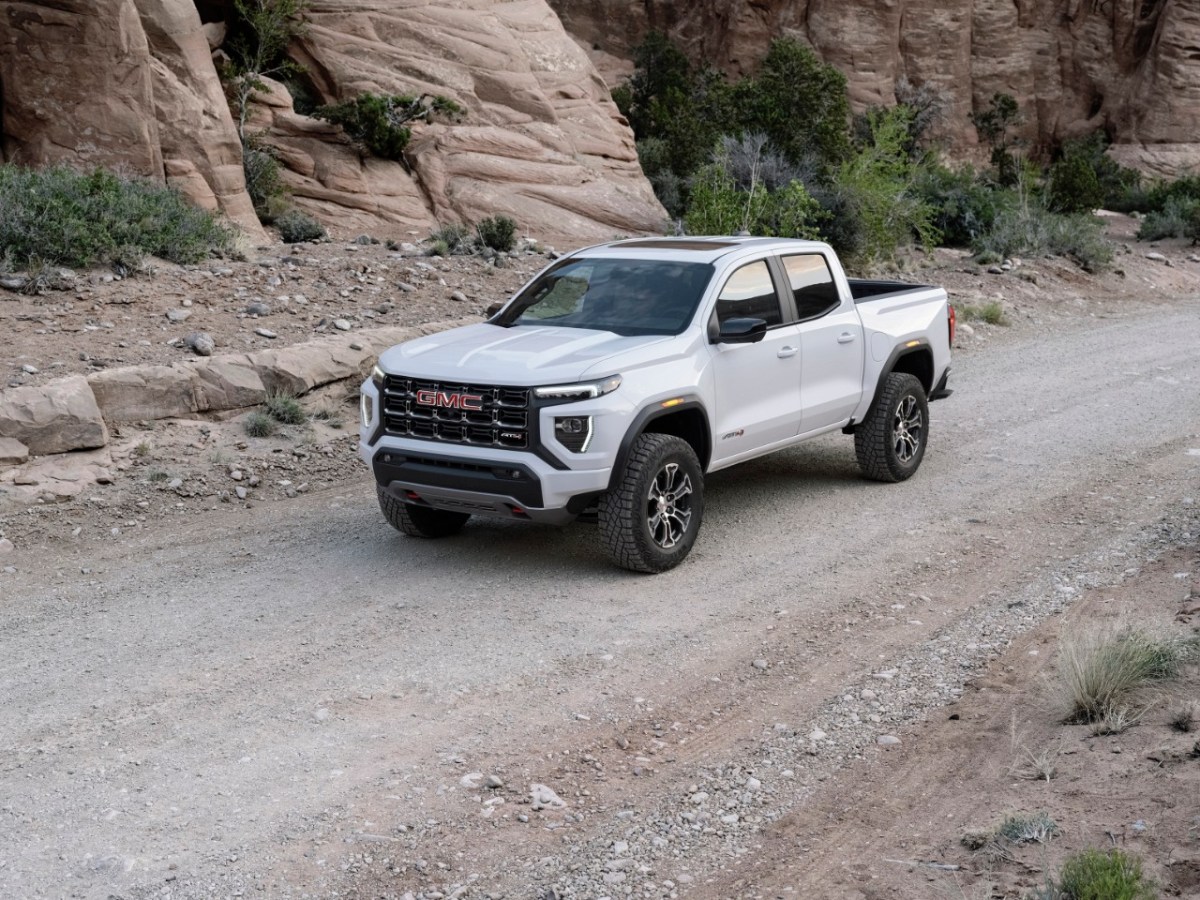 The new 2023 GMC Canyon AT4 on a dirt road 