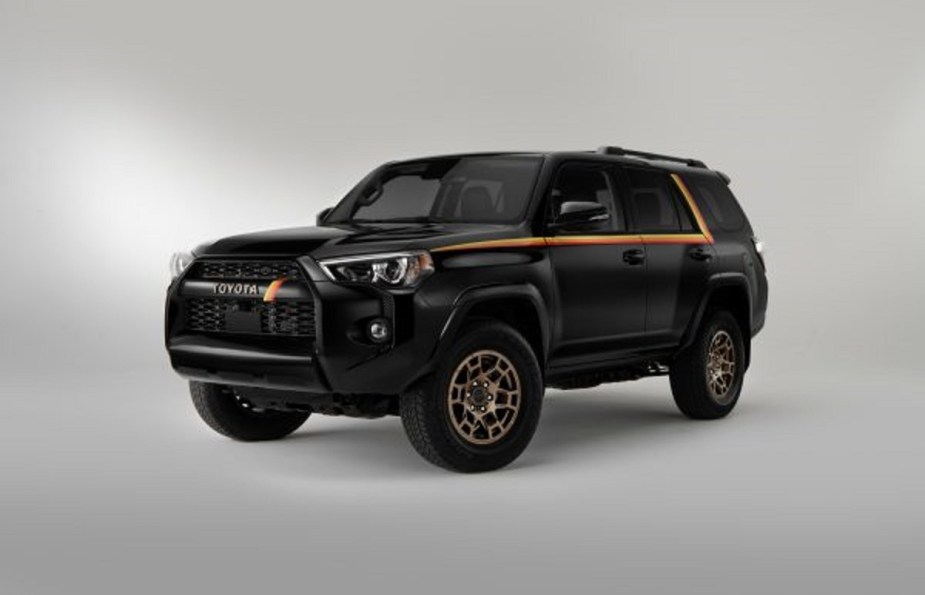 A black 2023 Toyota 4Runner with yellow and red stripes. 