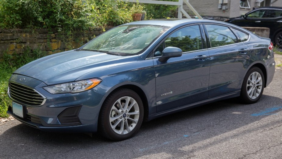 Blue 2019 Ford Fusion Hybrid Parked