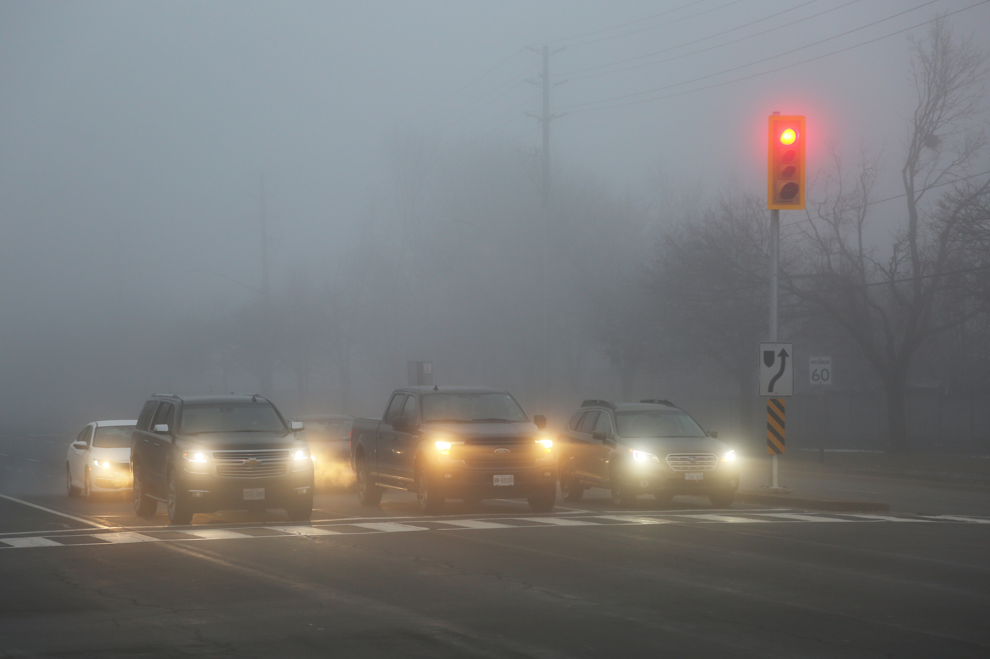 What should you not use if you encounter fog while driving?