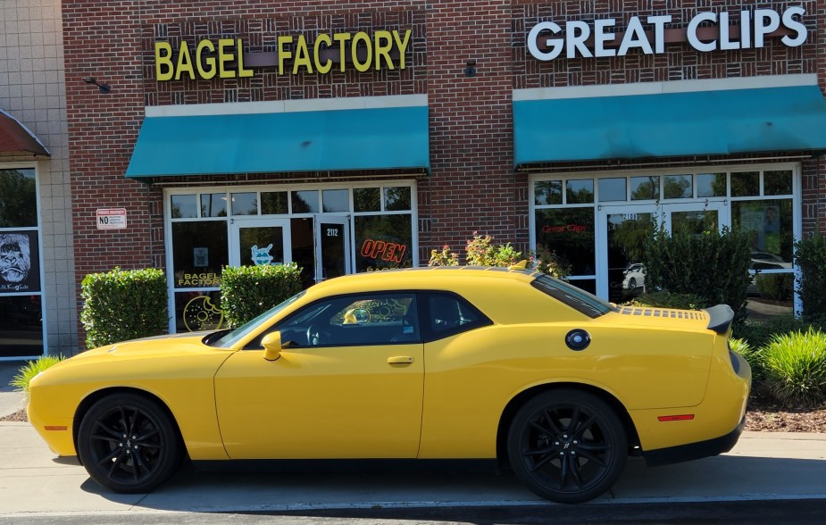 A Yellow Dodge Challenger in Front of Bagel Factory, the location of the Myrtle Beach Cars and Coffee Event