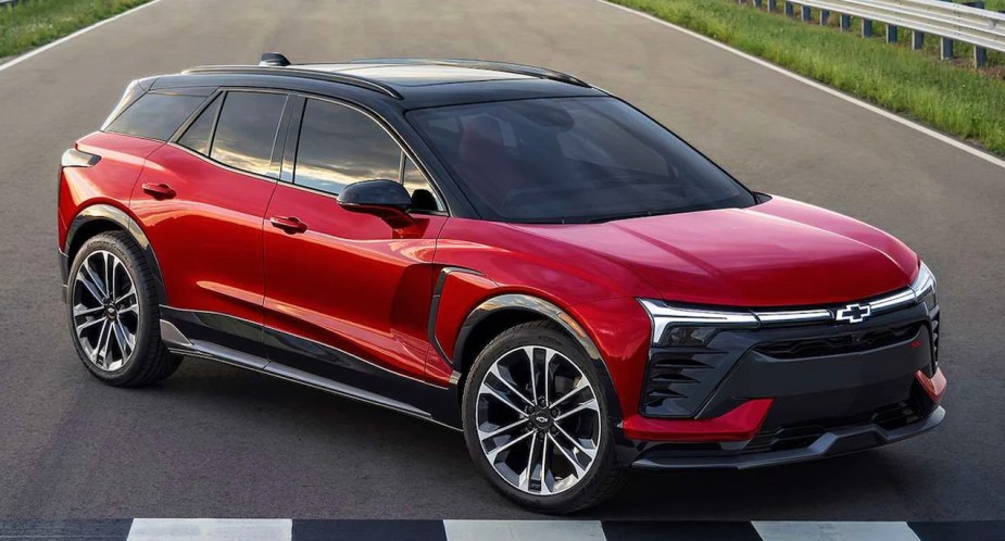 A red 2024 Chevy Blazer EV is parked.
