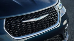 The deeply sculpted and athletic new front grille of the 2021 Chrysler Pacifica Pinnacle Hybrid is accented with a Platinum Chrome grille surround.