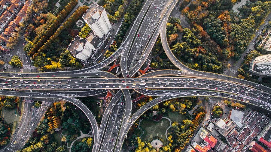 A bird's eye view of drivers commuting in a city