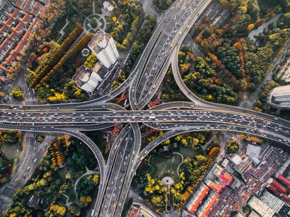 A bird's eye view of drivers commuting in a city