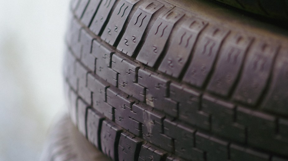 Close up view of tire, highlighting why car tires are black instead of white. When can you use a tire plug?