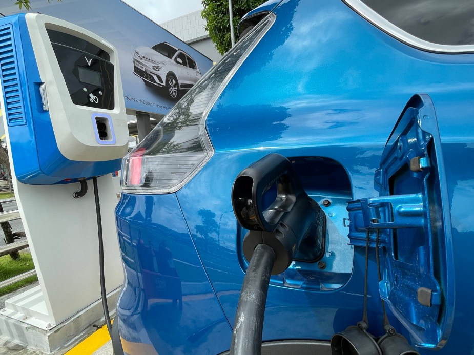 A blue EV charging.