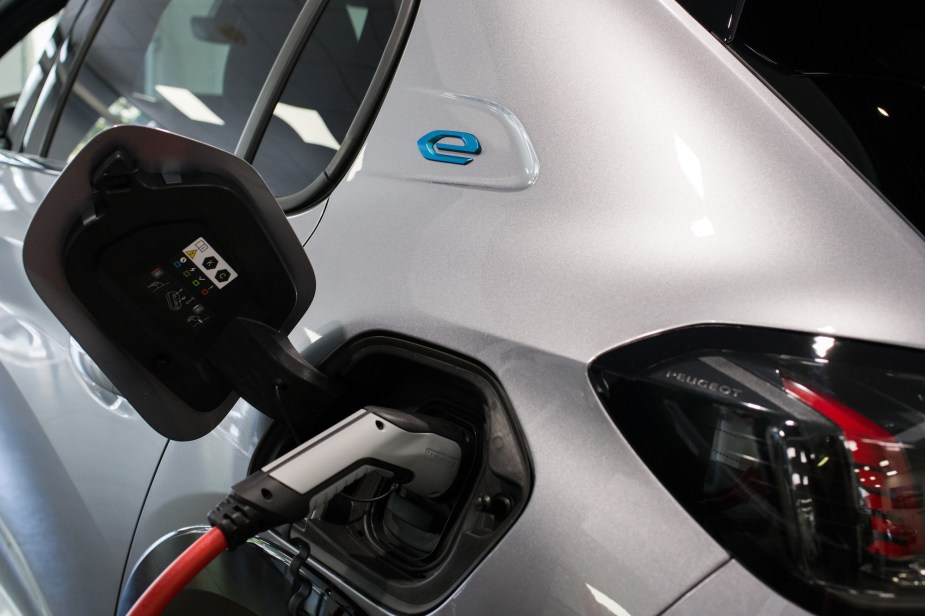 An EV charging increasing its driving range. 