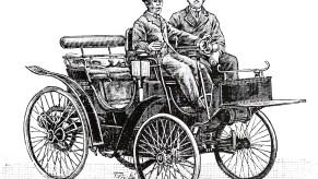 A black and white print of a very early Peugeot horseless carriage carrying a driver and a passnter.