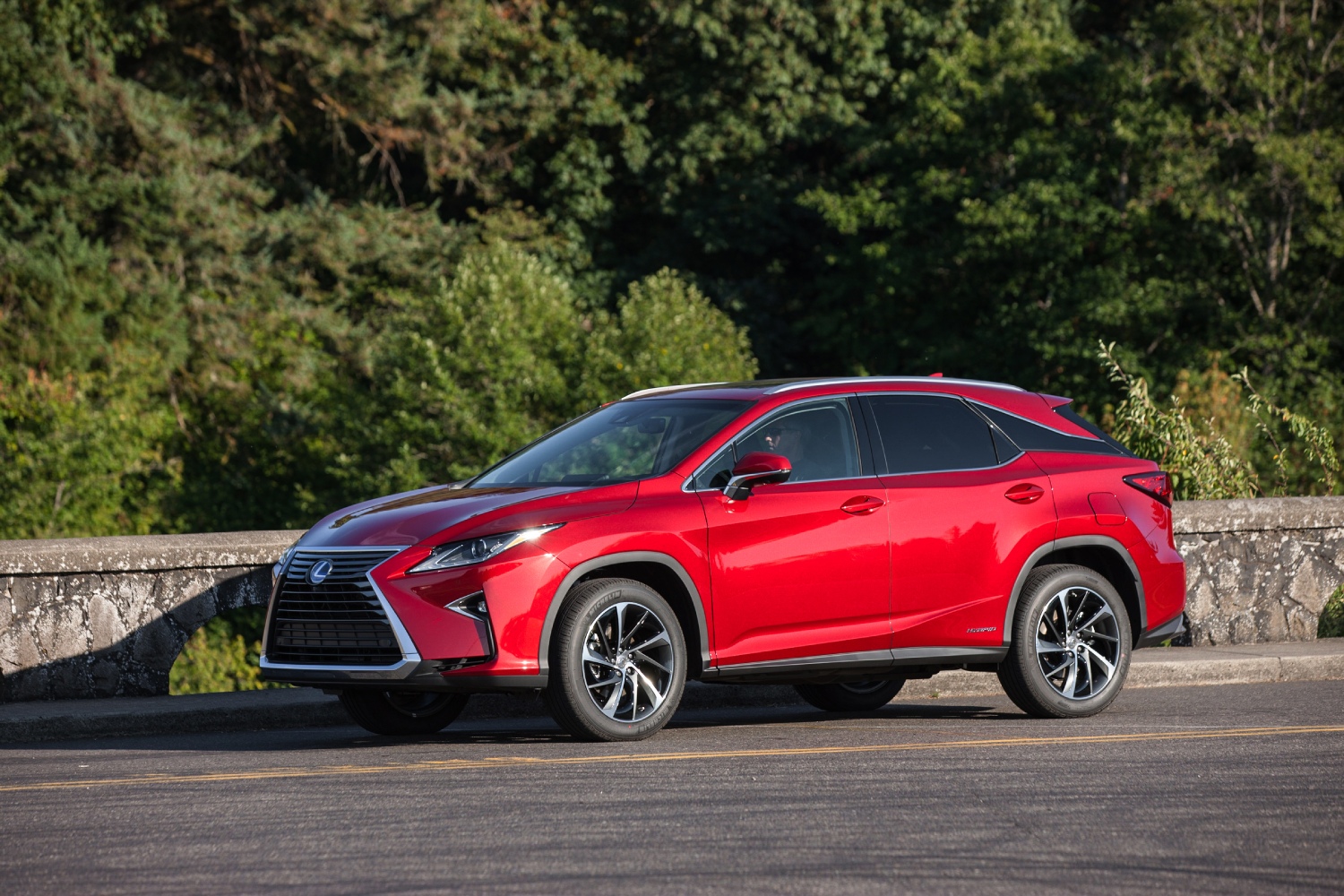 This family-friendly used midsize SUV is a Lexus RX