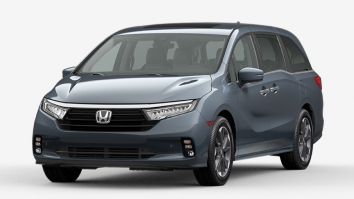 Front angled view of the 2023 Honda Odyssey minivan with the Sonic Gray Pearl exterior paint color option