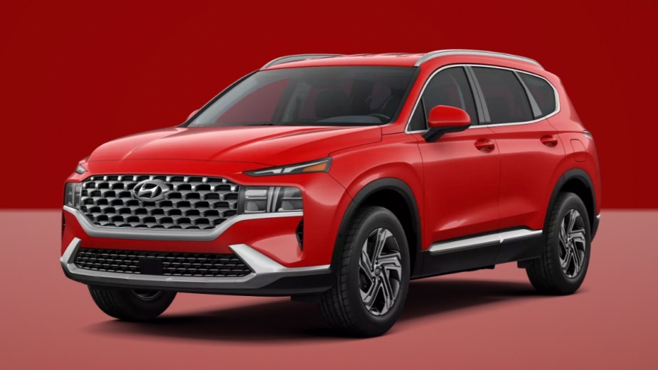 Front angle view of 2023 Hyundai Tucson crossover SUV with Calypso Red exterior paint color option