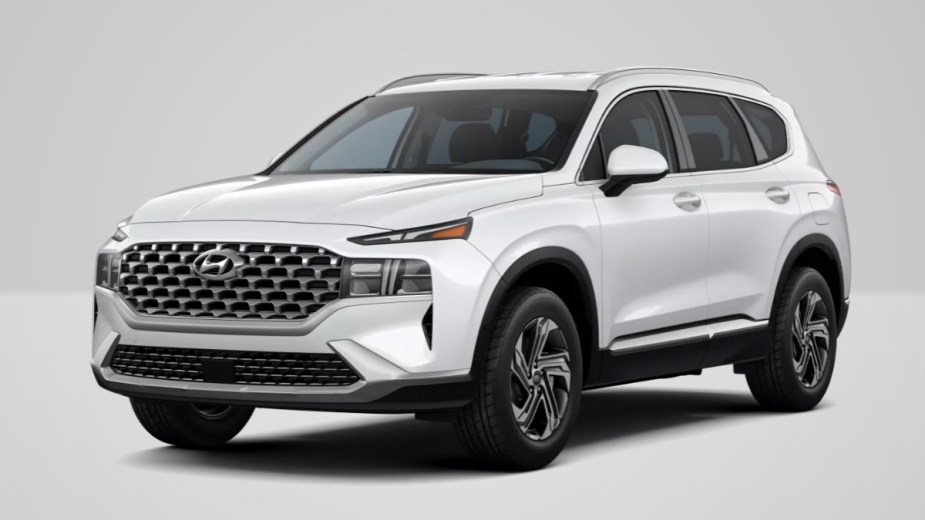 Front angle view of 2023 Hyundai Tucson crossover SUV with Quartz White exterior paint color option