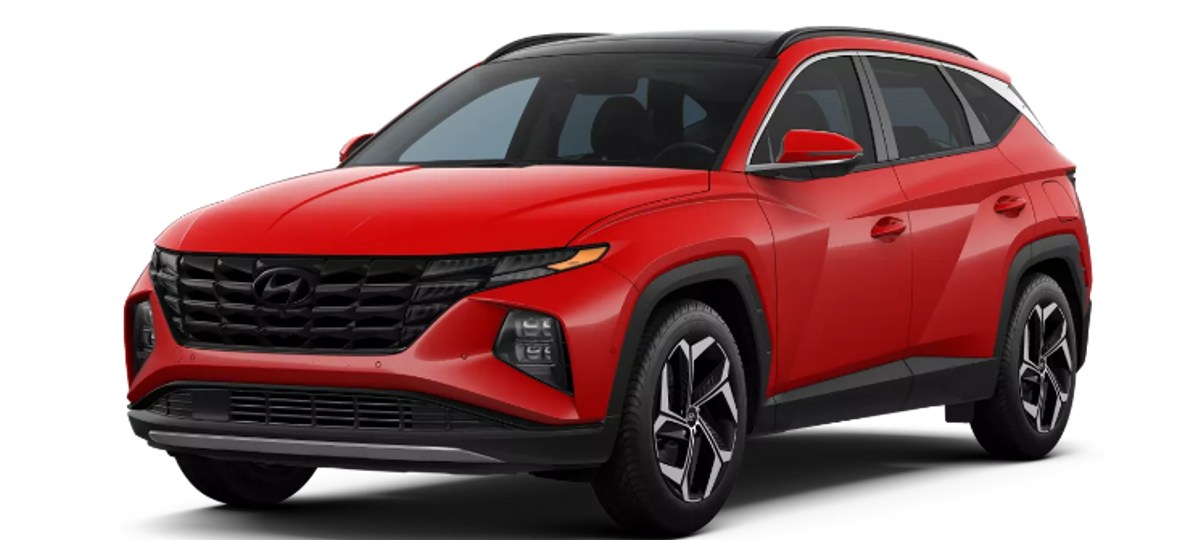 Front angle view of 2023 Hyundai Tucson crossover SUV with Calypso Red exterior paint color option