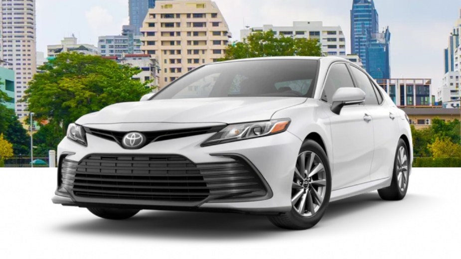 Front angle view of 2023 Toyota Camry midsize sedan with Wind Chill Pearl exterior paint color option