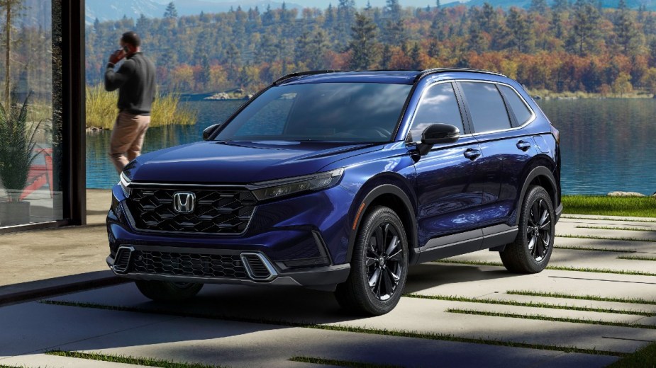 Front angle view of blue 2023 Honda CR-V crossover SUV