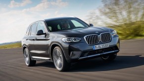 Front angle view of gray 2023 BMW X3, highlighting why luxury cars have boring names with numbers and letters