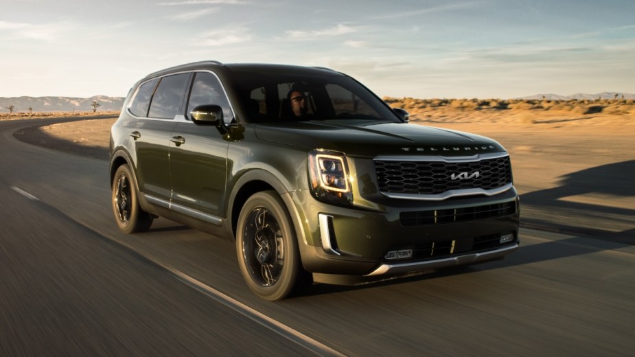 Front angle view of green 2023 Kia Telluride, highlighting reasons why Kia cars are so cheap