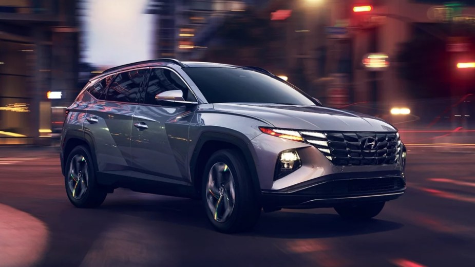 Front angle view of silver 2023 Hyundai Tucson crossover SUV