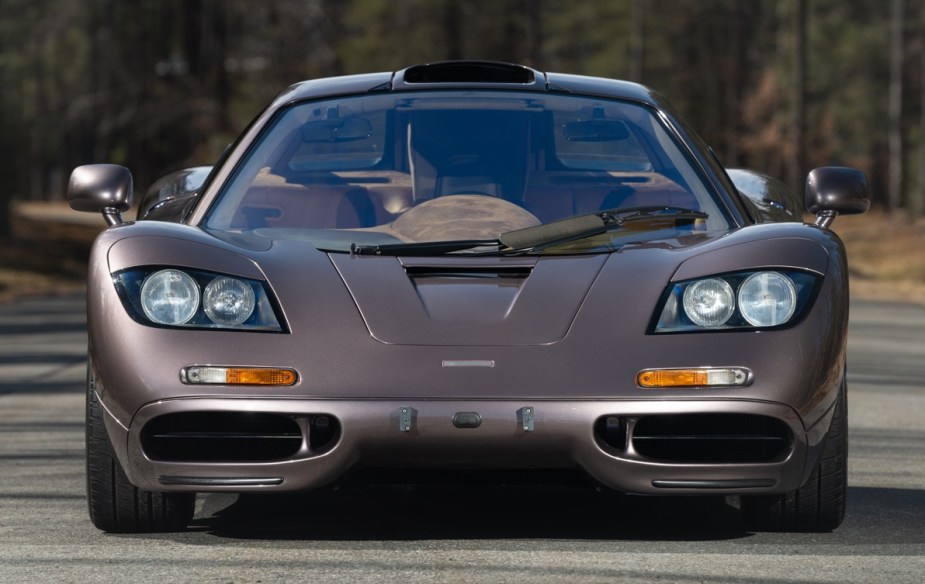 Front view of a brown McLaren F1, with a centrally-positioned driver's seat