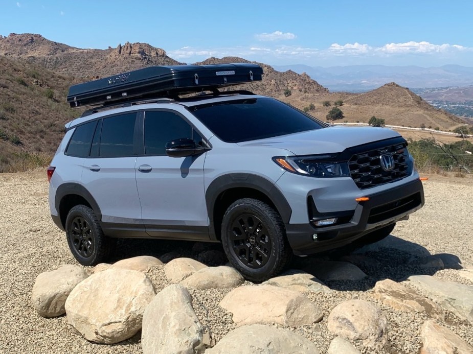 Honda Passport TrailSport posed on some tan rocks