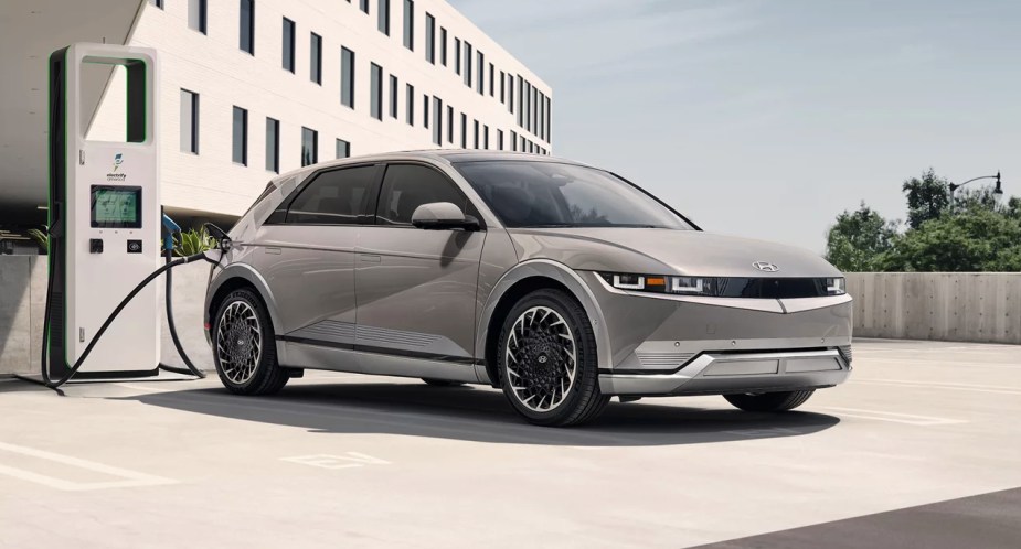 A gray Hyundai Ioniq 5 electric SUV is charging.