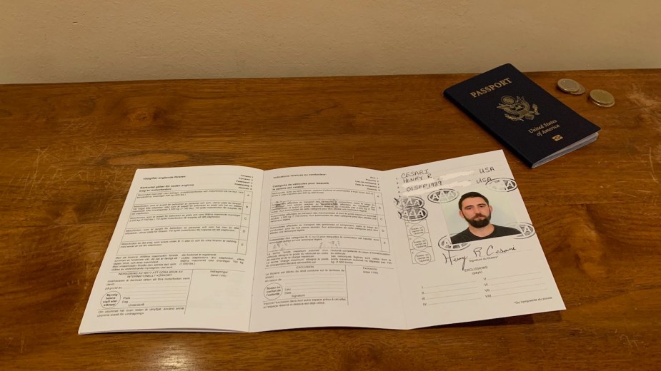 The author's International Driving Permit (IDP) folded open with picture visible.