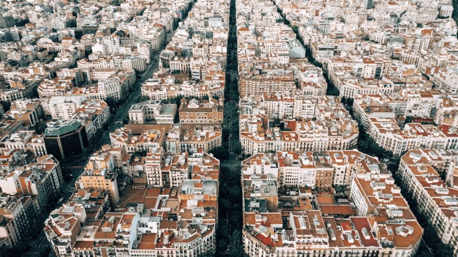 A view of Barcelonas city super block organization with two-way thoroughfares and local streets.