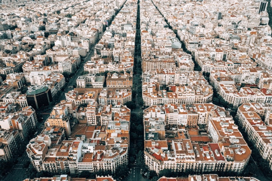 Barcelona from the sky, a dozen huge city blocks and several major streets visible.