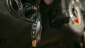 A set of car keys in an ignition.