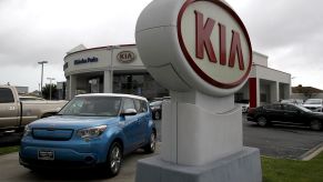 Kia logo at a Hyundai dealership