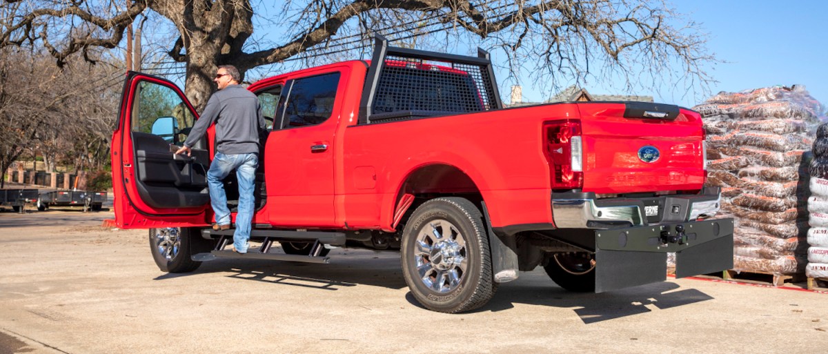 Why Do Some Pickup Trucks Have Huge Flaps Hanging Behind Their Wheels?