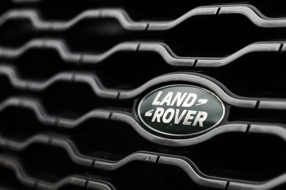 A Land Rover logo inside a grille. 